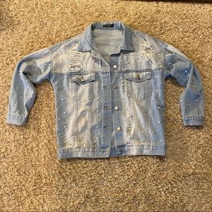 Distressed light wash denim jacket